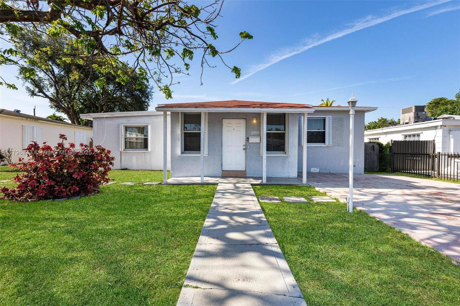 Charming Ranch Style Home with Sunroom.