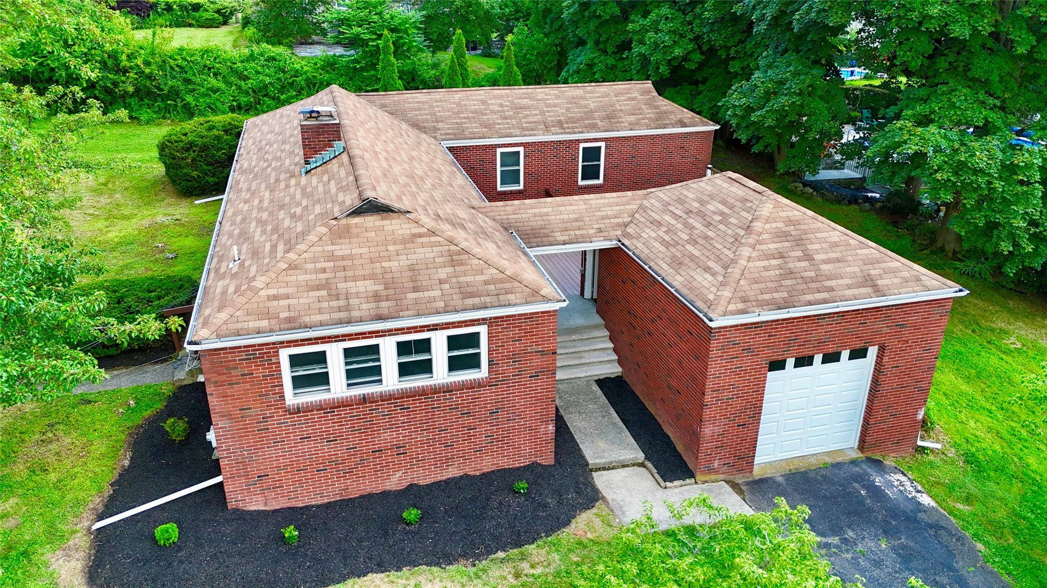 Welcome home to this charming L shaped brick ranch in desirable New Windsor !