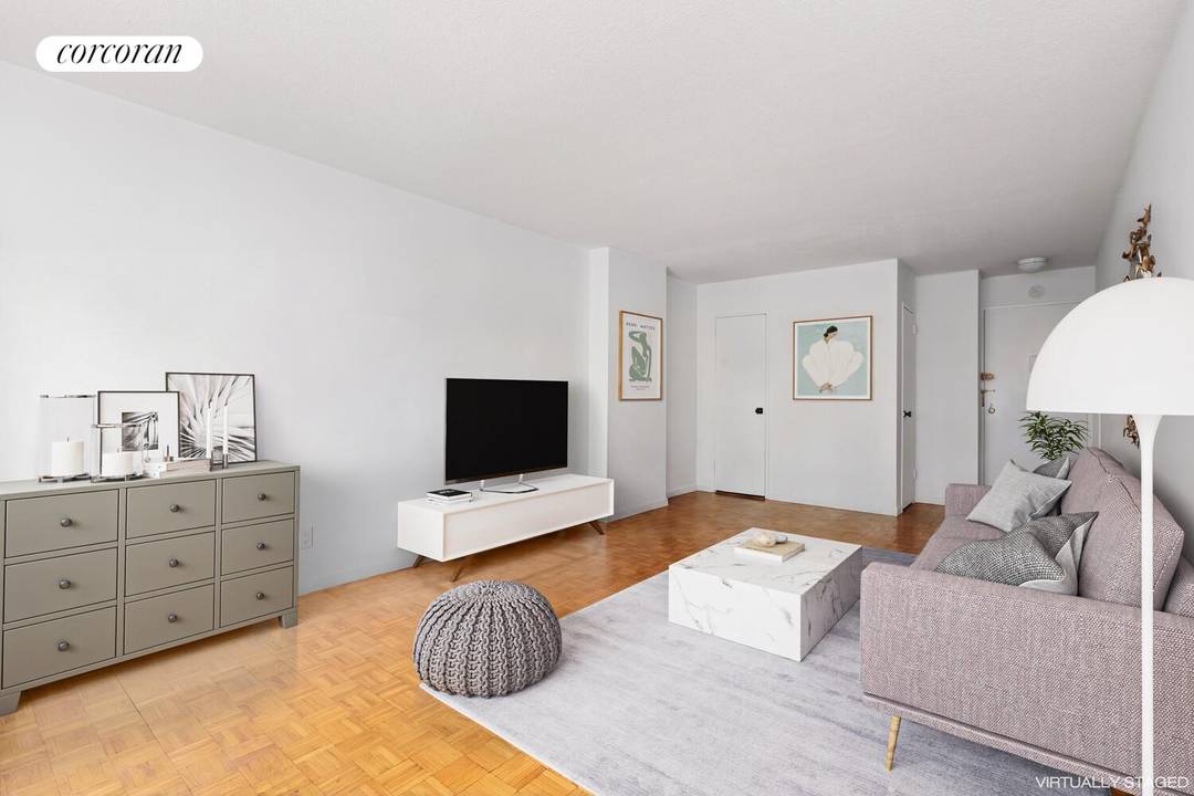 This large alcove studio is faces north along tree lined E 81st Street and has a wall of windows with great light.