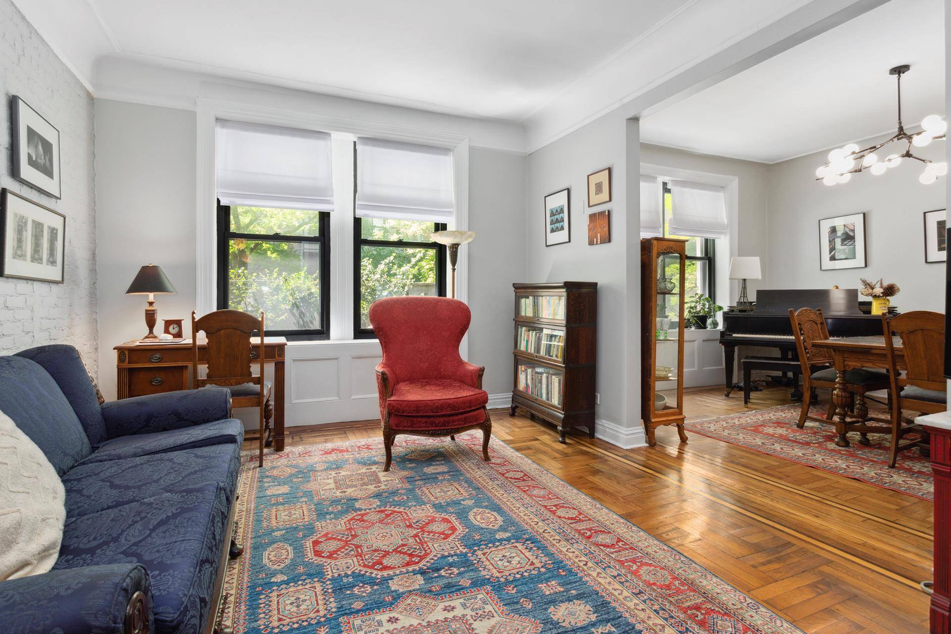 Charming two bedroom, two bath apartment with soaring ceilings and pre war details throughout, located in a historic prewar beaux arts Carnegie Hill boutique co op.