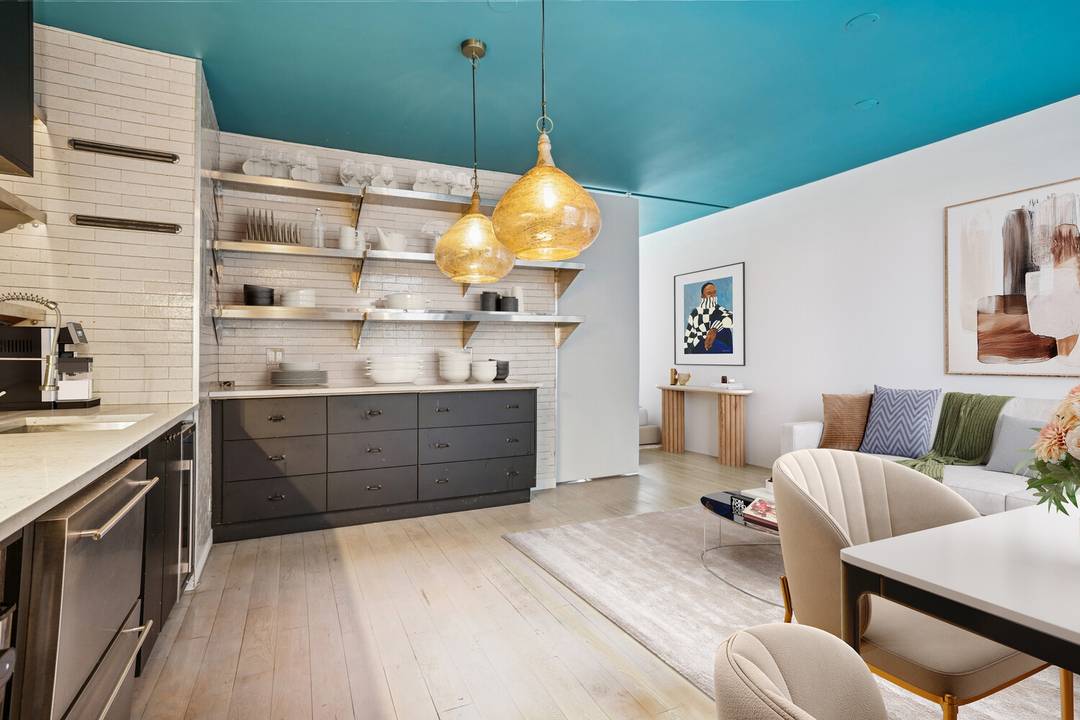 Tucked along a peaceful, tree lined block in the heart of SoHo, this beautifully curated junior one bedroom home blends modern design with classic downtown charm.