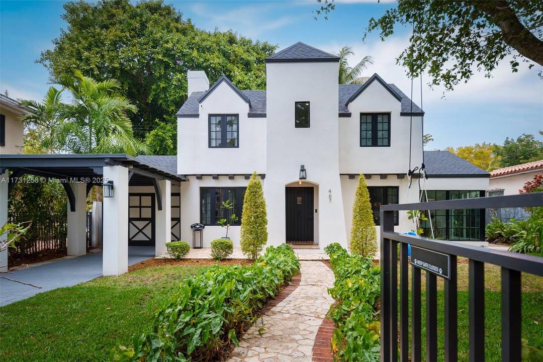Renovated Tudor style home in gated Morningside.
