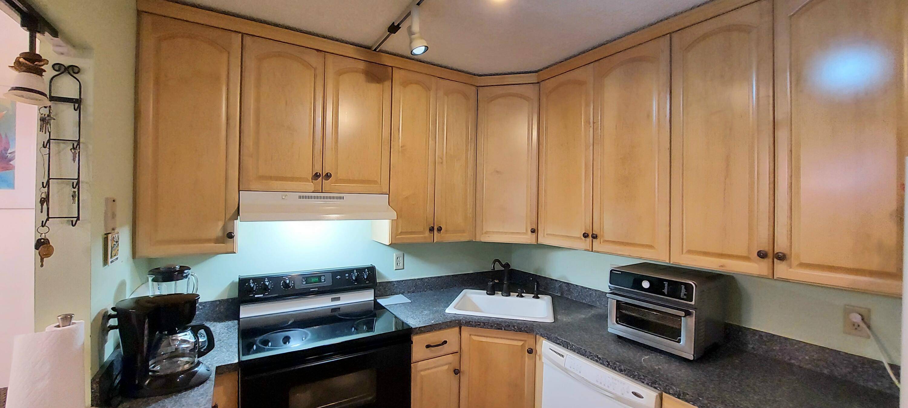 This charming 2 bedroom, 2 bath condo located on the 1st floor in a peaceful 55 community is perfect for those seeking comfort and convenience.