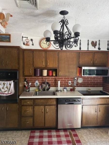 This well maintained bi level home, set on over an acre of land, offers a peaceful setting near a scenic lake and a local park.