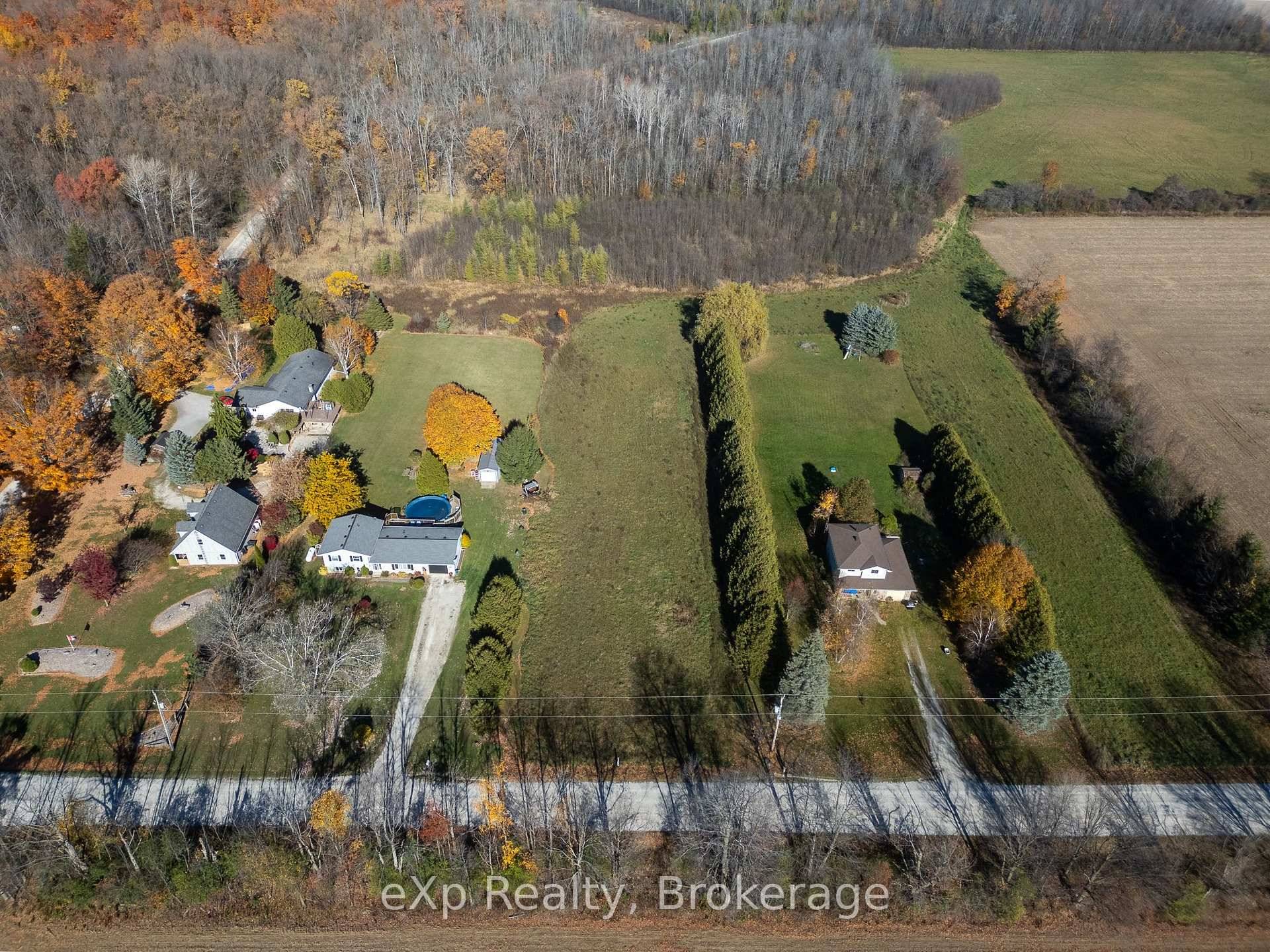 Discover the perfect spot for your dream home or cottage retreat on this serene, 1.