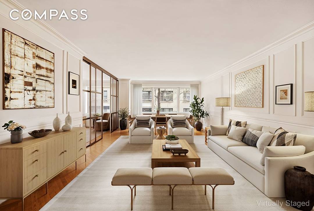 Welcome to Apartment 2C, a spacious two bedroom, two and a half bath home offering a classic layout and the flexibility to be converted to a three bedroom or office.