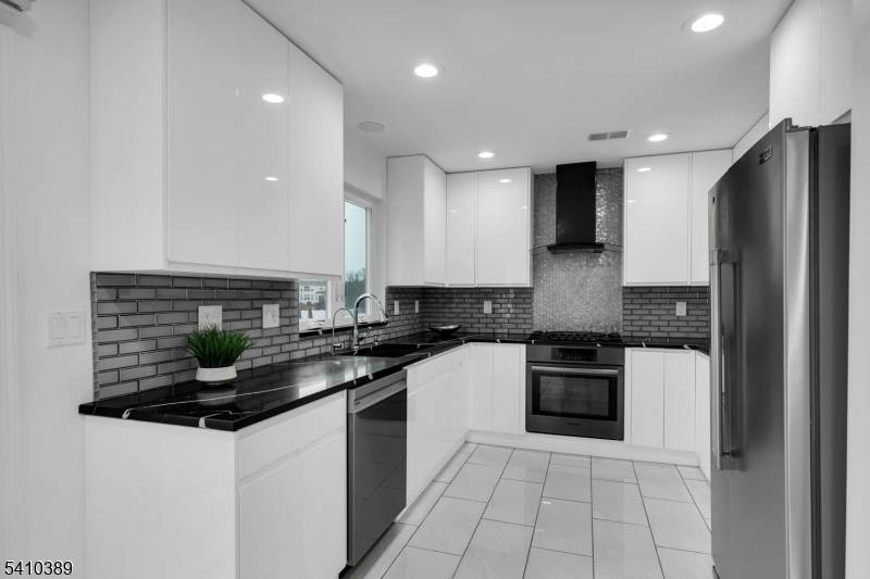 Tucked within a desirable Bridgewater neighborhood, this beautifully updated Colonial showcases modern hardwood flooring throughout, new 2024 energy efficient windows, solar panels, and a designer kitchen blending timeless architecture with ...