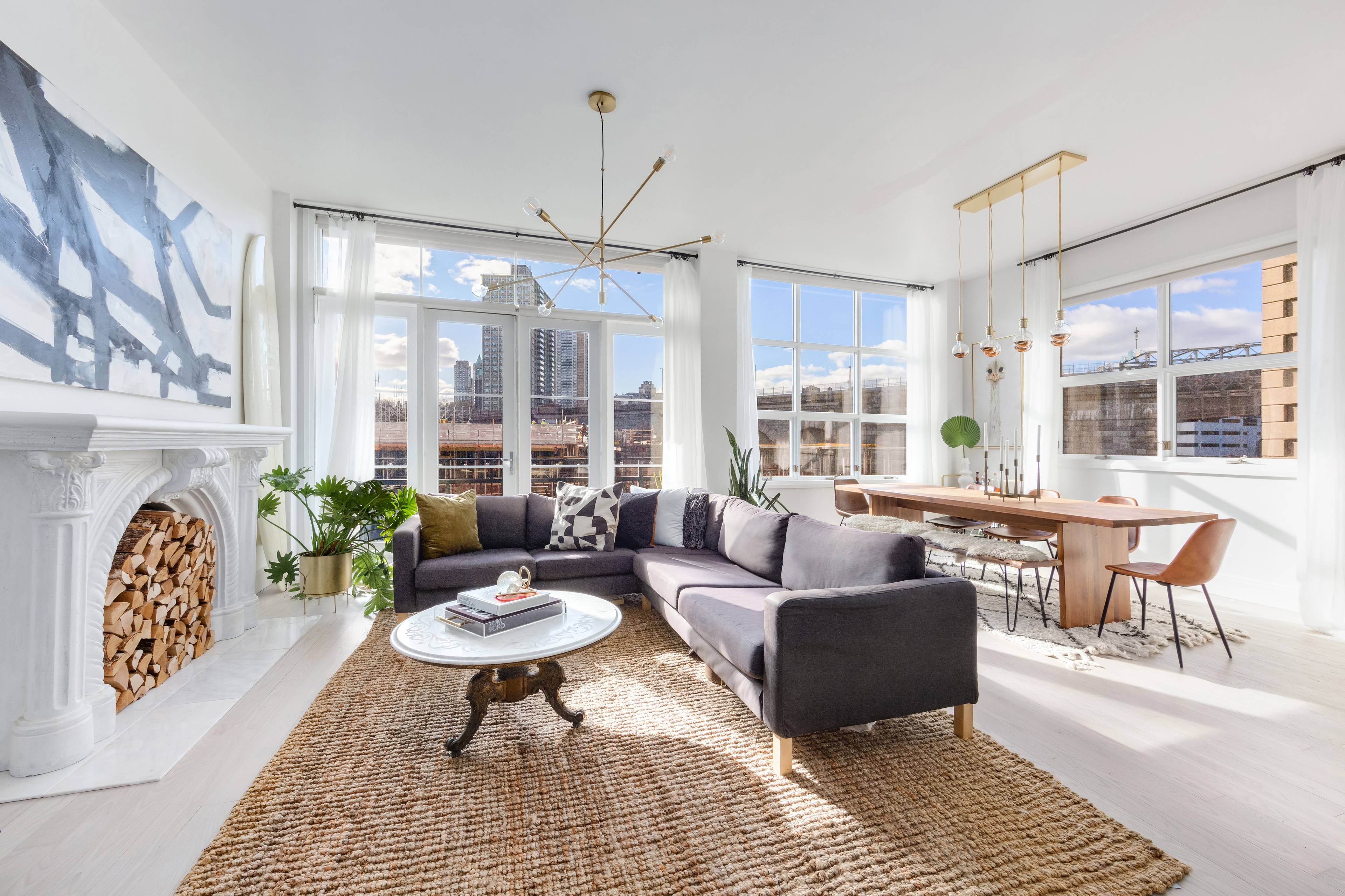 Chic designer style and extraordinary sunlight fill every inch of this recently renovated convertible three bedroom, two bathroom condo in ultra desirable Dumbo.