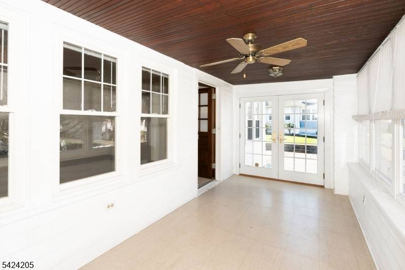 Expanded Cape style home offering 5 bedrooms and 2.