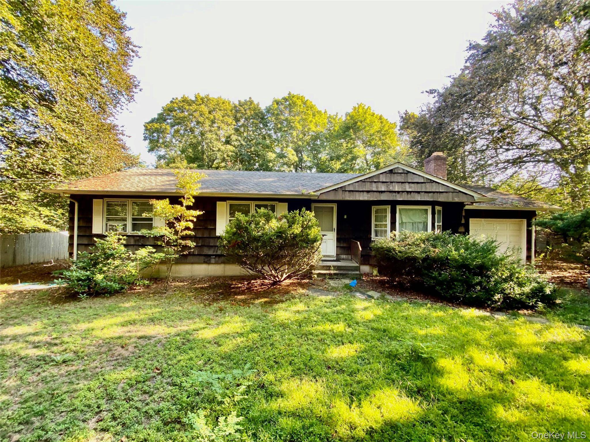 This ranch home offers 3 bedrooms, 2 full baths, living room with a fireplace, open kitchen floor plan, rear deck, one car garage, and a dry full basement.