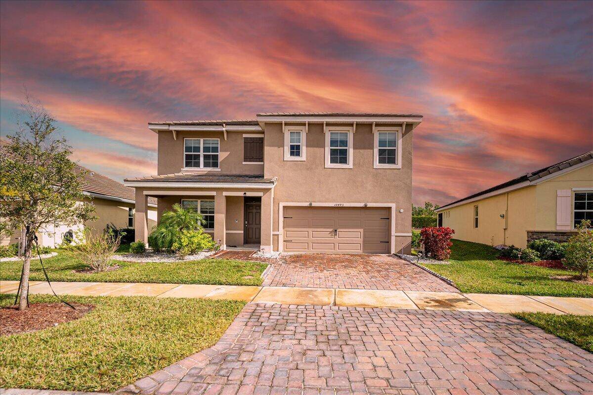 Discover this stunning estate home in the prestigious gated community of Estates at Tradition !