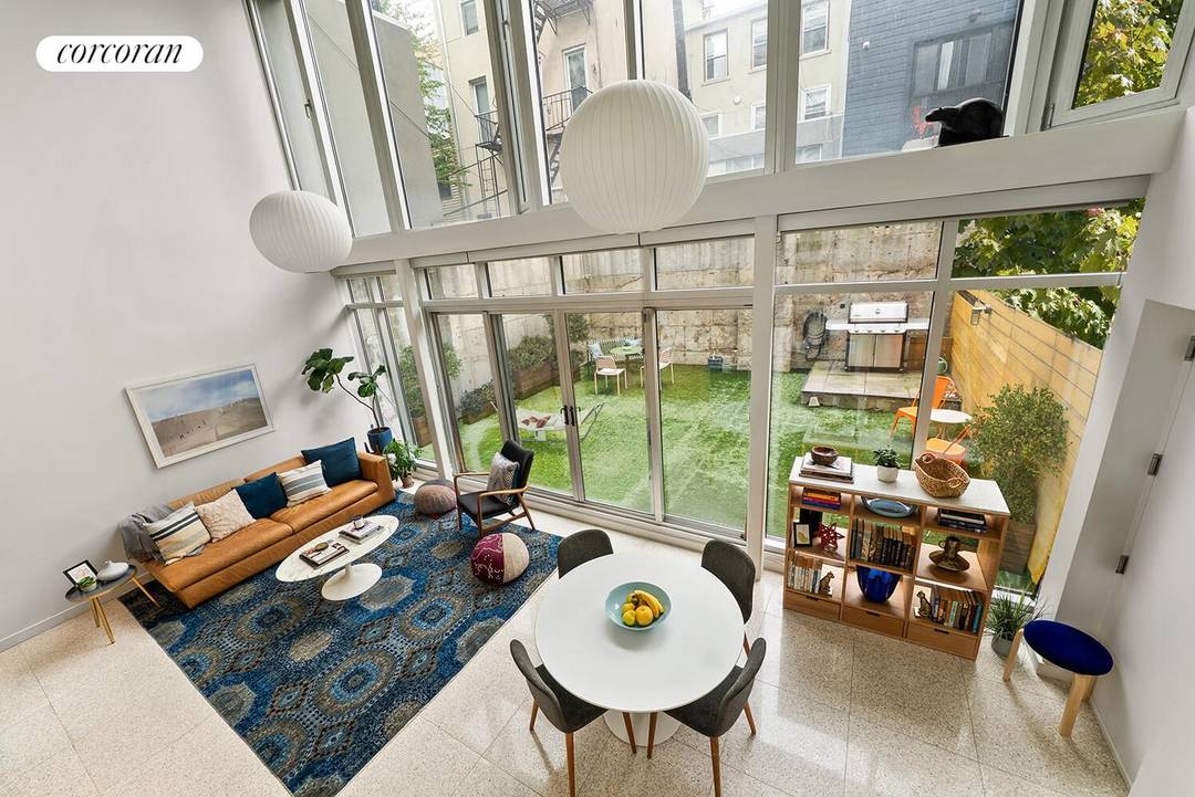 Welcome home to 23 Garfield Place, a stunning, and newly renovated, two bed, two bath duplex with double height ceilings, a spacious backyard, and parking available for purchase !