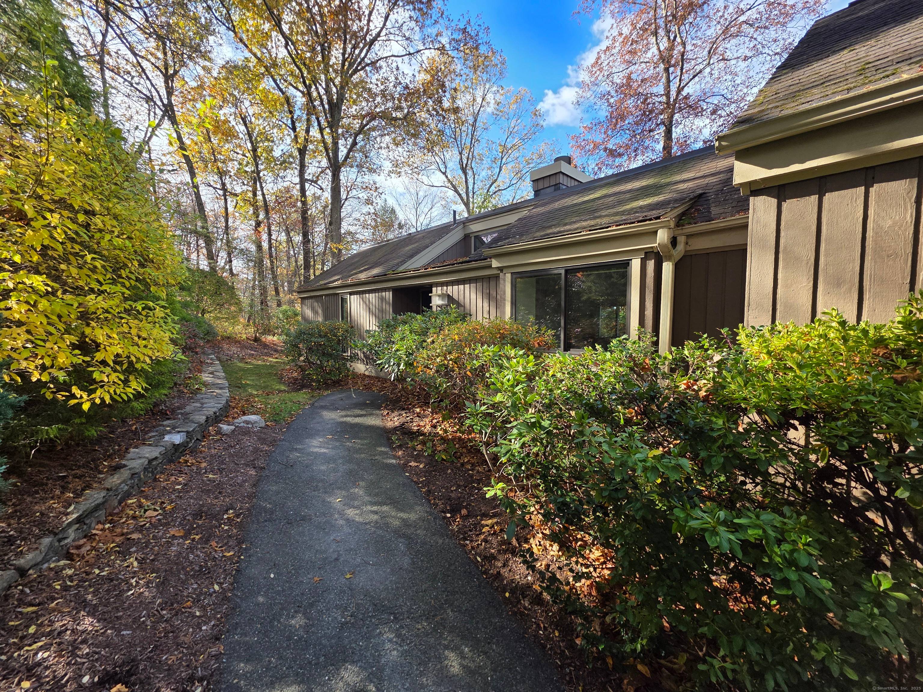 The short, gently sloping walkway ends at your condo, making this a very private location w green space in the side and backyards and the 110 acre nature preserve just ...