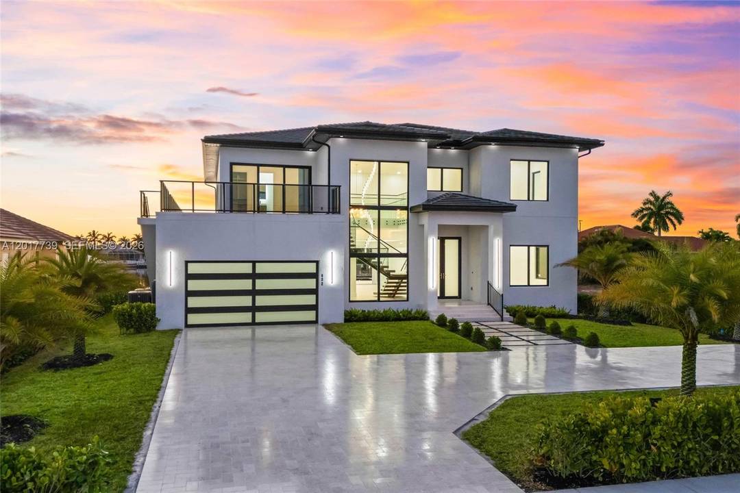 Newly constructed in 2026, this Gulf access custom two story waterfront estate offers 6 bedrooms plus a den, 6.