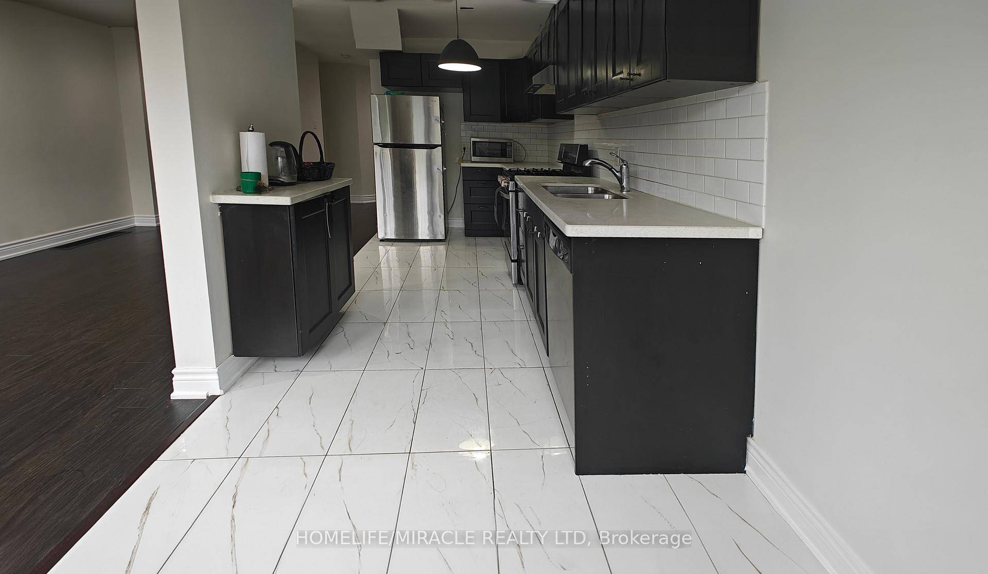 This charming family townhome boasts 3 bedrooms and 3.