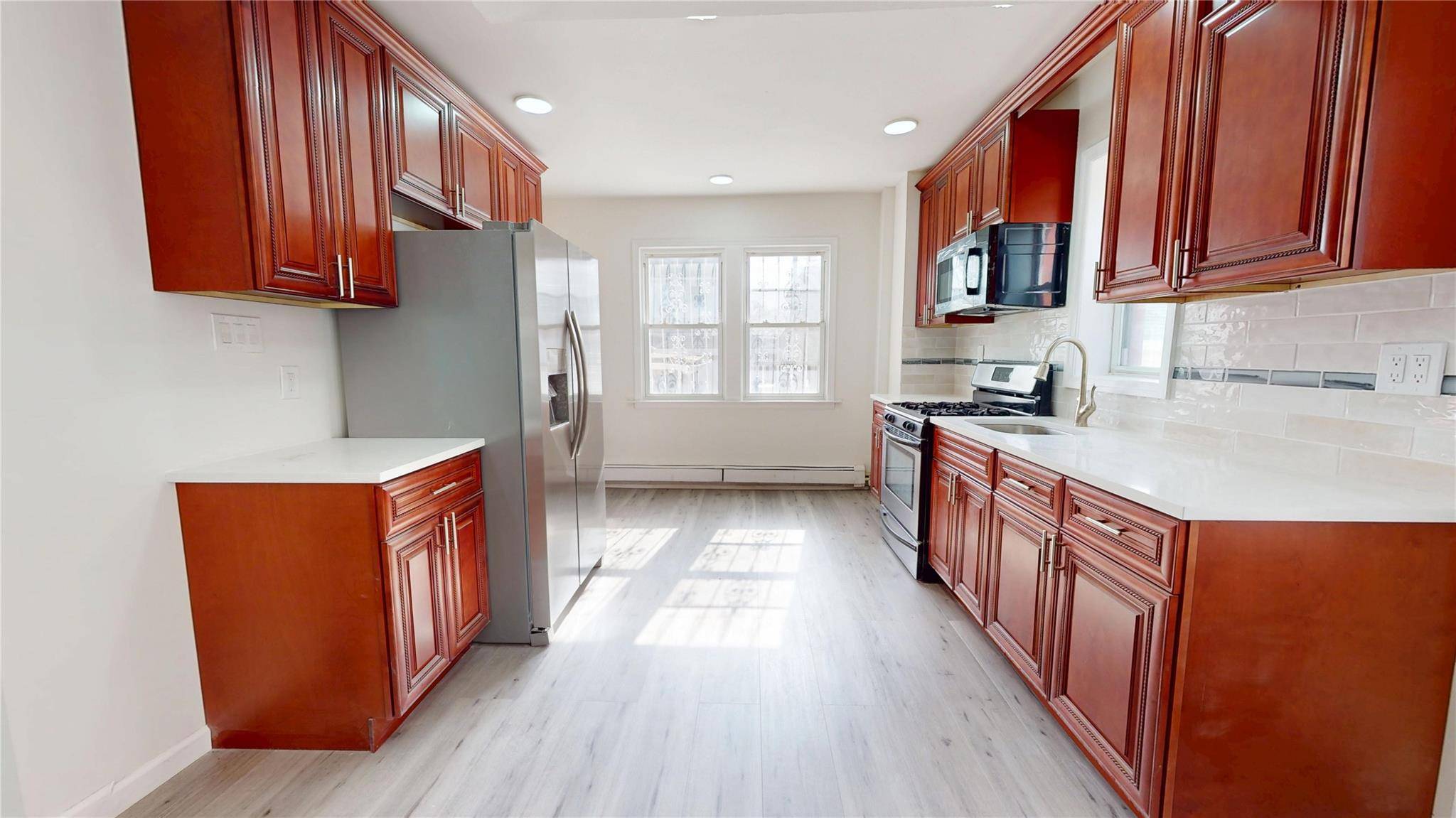 Fully Renovated 2 Family Home in Jamaica, Queens Newly renovated 2 family home featuring 7 bedrooms, 4 bathrooms, and 3 kitchens.