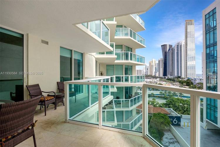 Enjoy elevated coastal living on prestigious Collins Avenue in this elegant 3 bedroom, 2 bath residence with partial ocean, intracoastal, and city views.