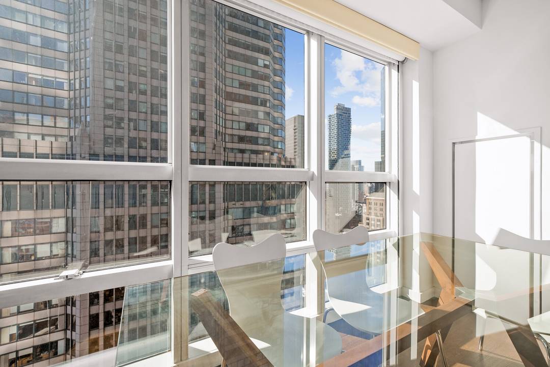 Welcome to your urban oasis nestled in the prestigious address of 146 West 57th Street, 37E.
