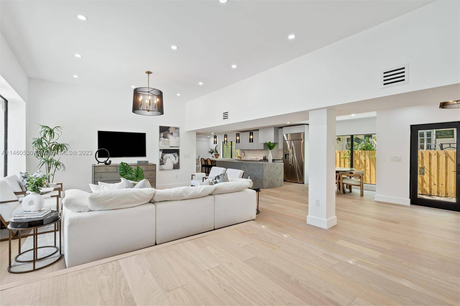 This stunningly renovated home will immediately demand your attention as you step through the door, with its large open living spaces and high end finishes.