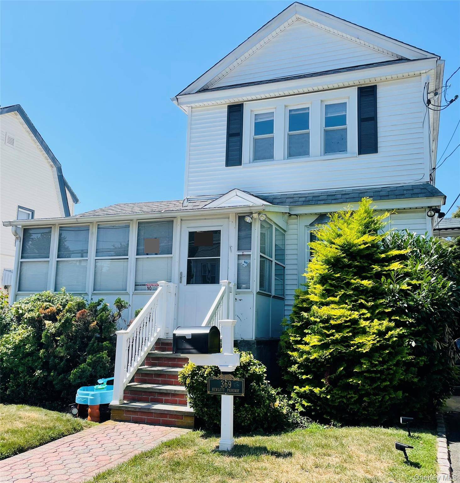 Welcome to this charming 3 bedroom, two and a half bath Colonial located in the heart of Hewlett !