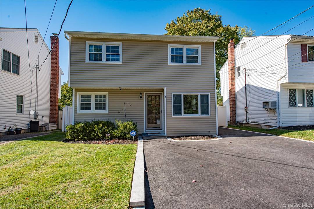 Welcome to this charming 3 bedroom, 2 bath Colonial located in a sought after beach community with private beach rights.