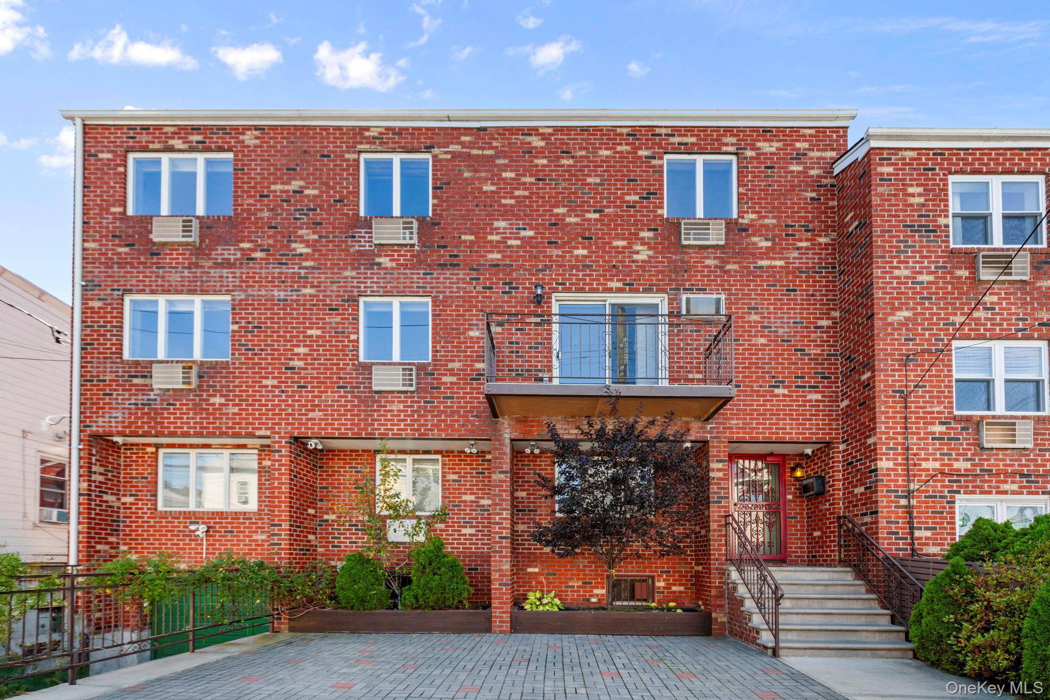College Point Renovated 2 Family Brick with Heated Driveway, Garage amp ; Multi Vehicle Parking.