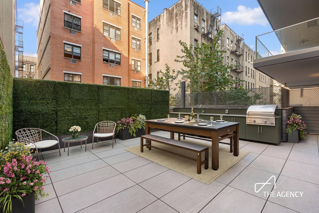 Featuring a 500 sqft private terrace with outdoor kitchen the last available deeded parking spot.