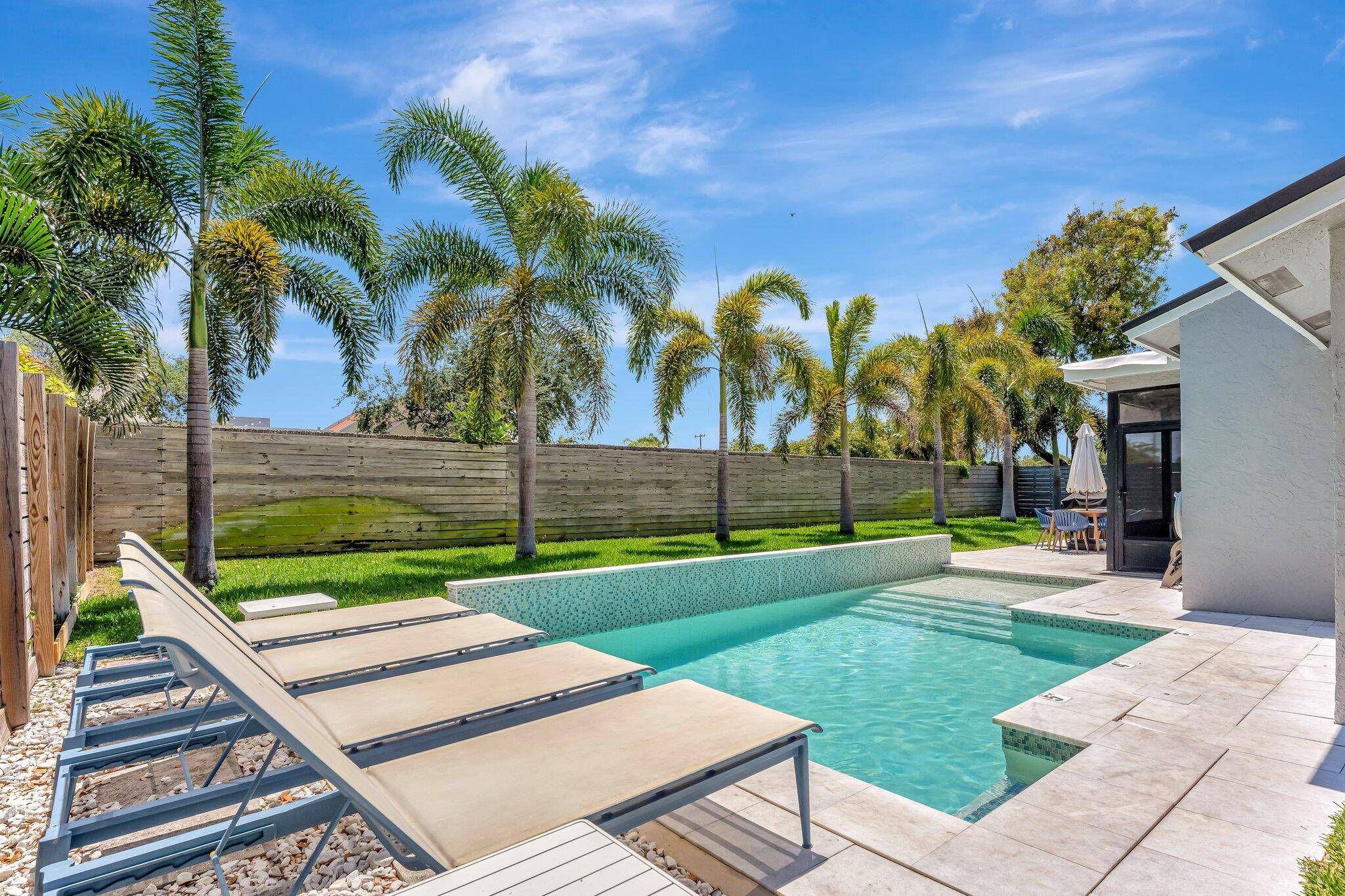 Nestled in the desirable Lake Ida neighborhood of Delray Beach, this home is a beautifully remodeled ranch style home that offers both comfort and style.