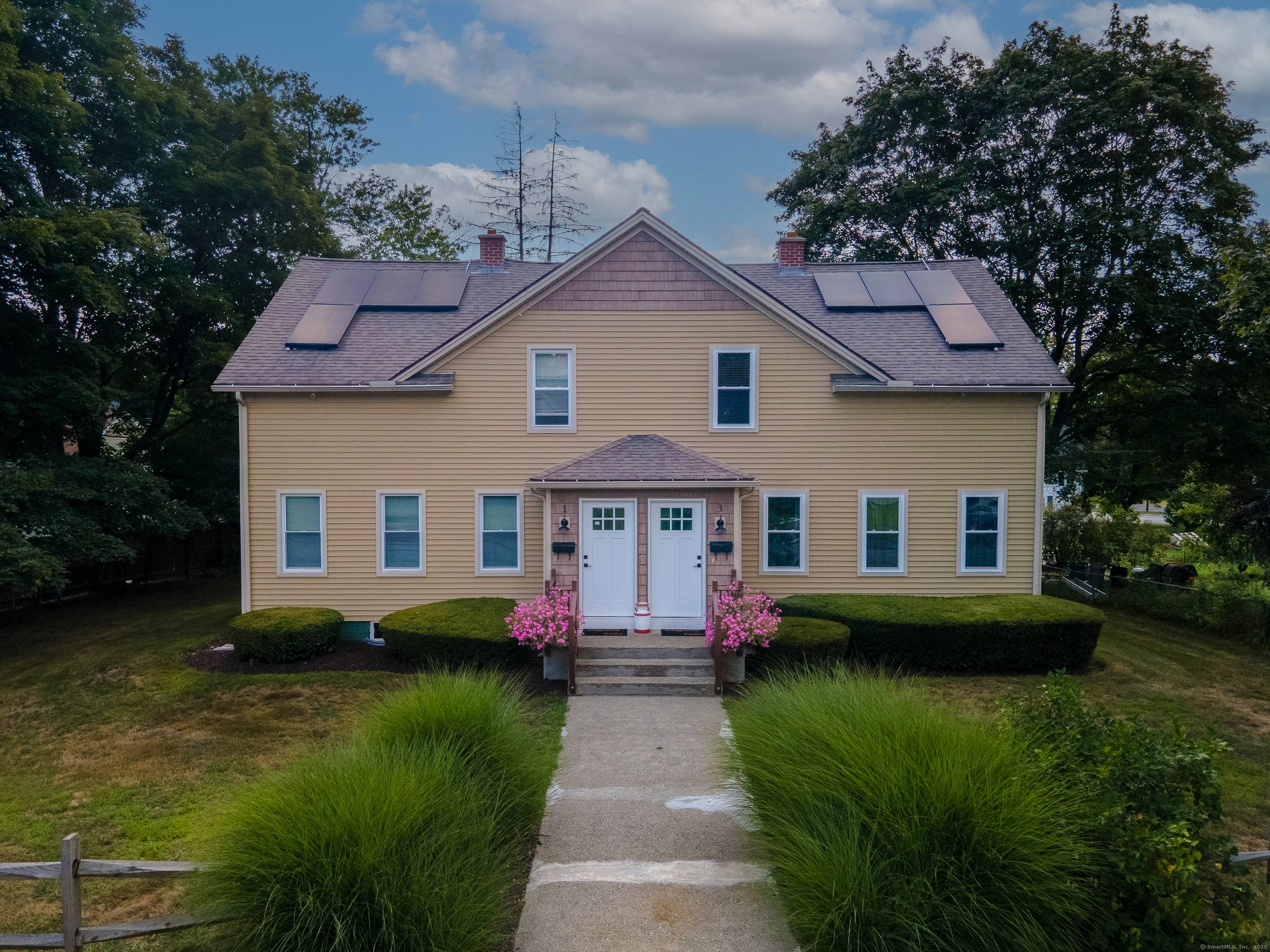 Beautifully Renovated 2 Family Home Perfect for Investment or Extended Family Living !
