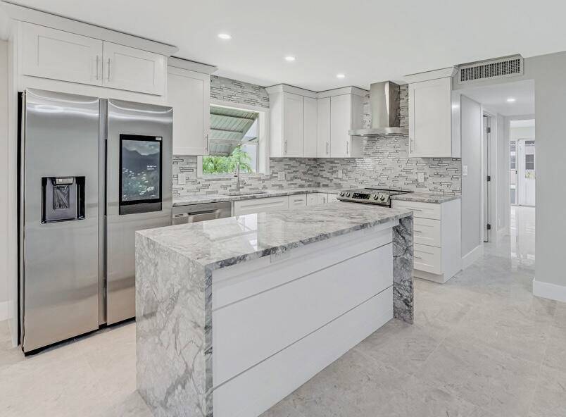 Welcome to this beautifully updated 2 bedroom 2 bath ground floor condo in the desirable 55 community of Kings Point in Delray Beach.