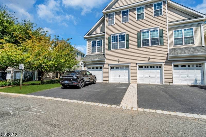 Welcome to the Stunning End Unit Townhome with Canal views and abundant natural light.