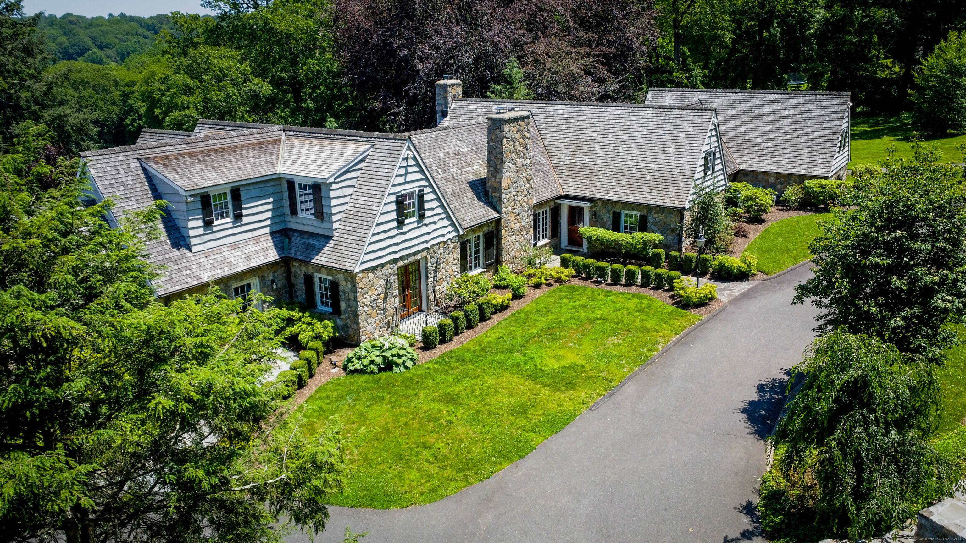 Discover this one of a kind custom built Cape style home set on a breathtaking 15 acre estate.