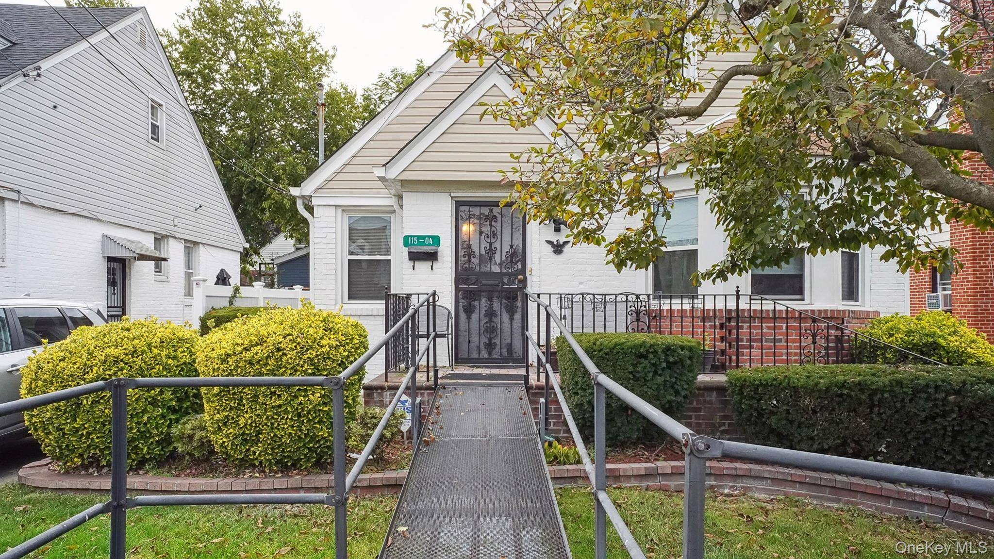 Welcome to Elmont ! This charming brick Cape offers the perfect balance of space, comfort, and functionality.