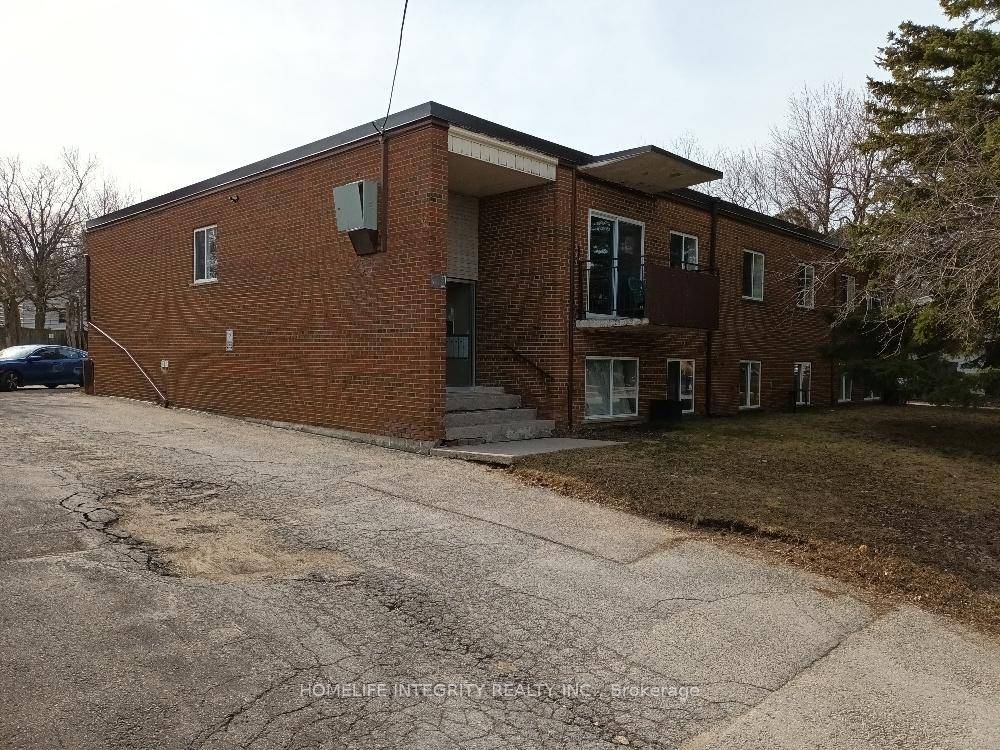 Rarely available and inexpensive Purpose built 1970 Residential 8 Plex apartment building.