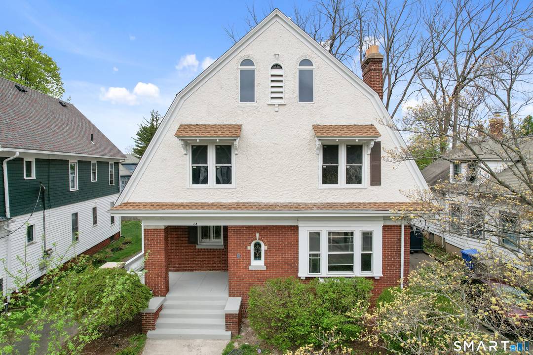 Spacious and beautifully updated, this 4 bedroom, 1.