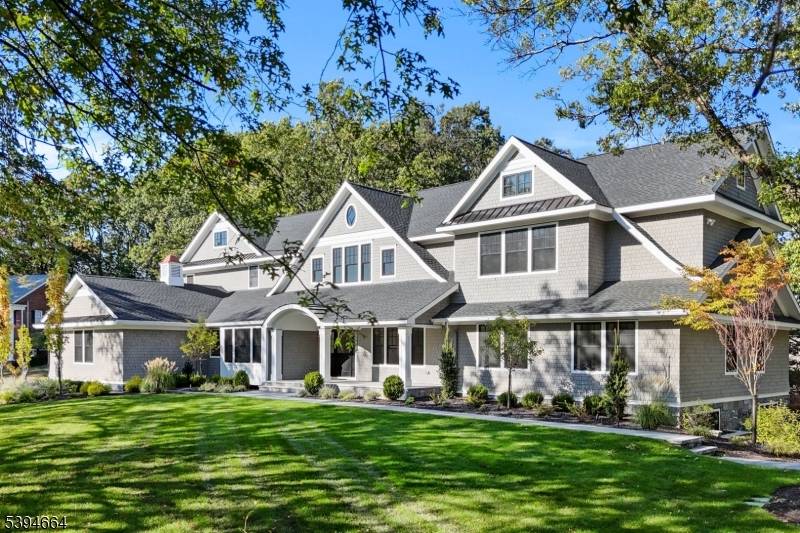 Discover Short Hills sophistication with Nantucket coastal elegance at 330 Hartshorn Drive, a newly rebuilt estate where timeless architecture meets curated modern luxury.