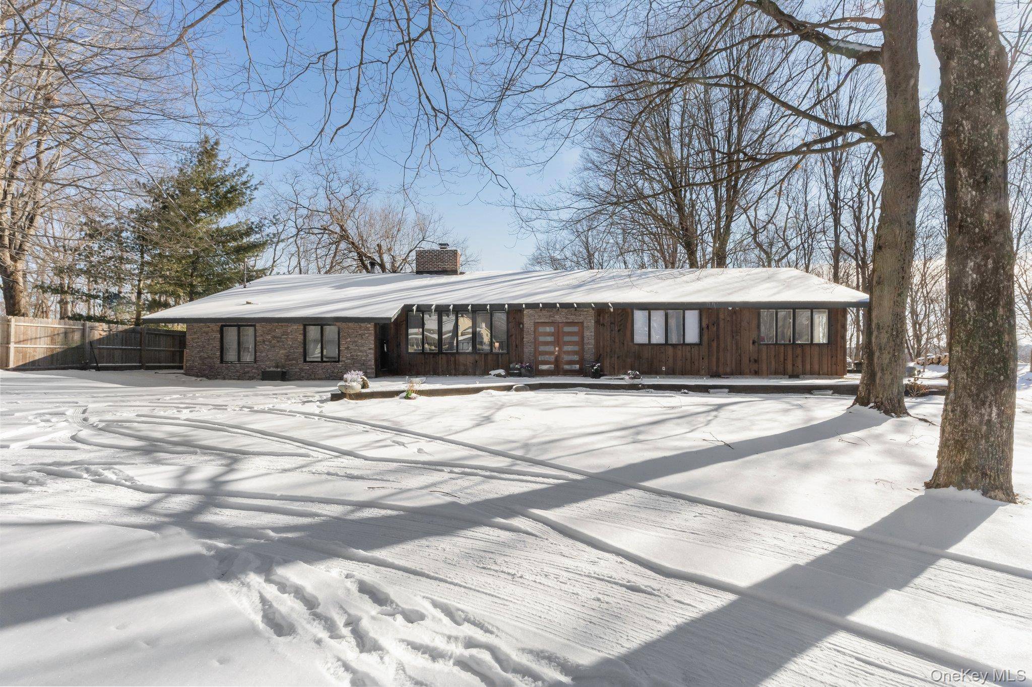 Escape to this stunning 4 bedroom, 2 bathroom furnished rental in the heart of Pound Ridge, NY.