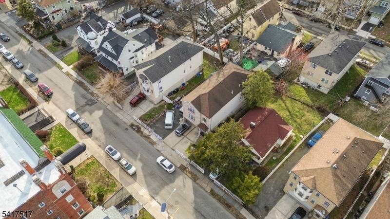 Newer construction three family income producing property built in 2005 in a convenient East Orange location ideal for NYC commuters.