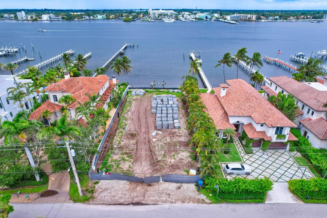 Direct intracoastal cleared lot in a no wake zone with permit to build massive waterfront estate ready to go !