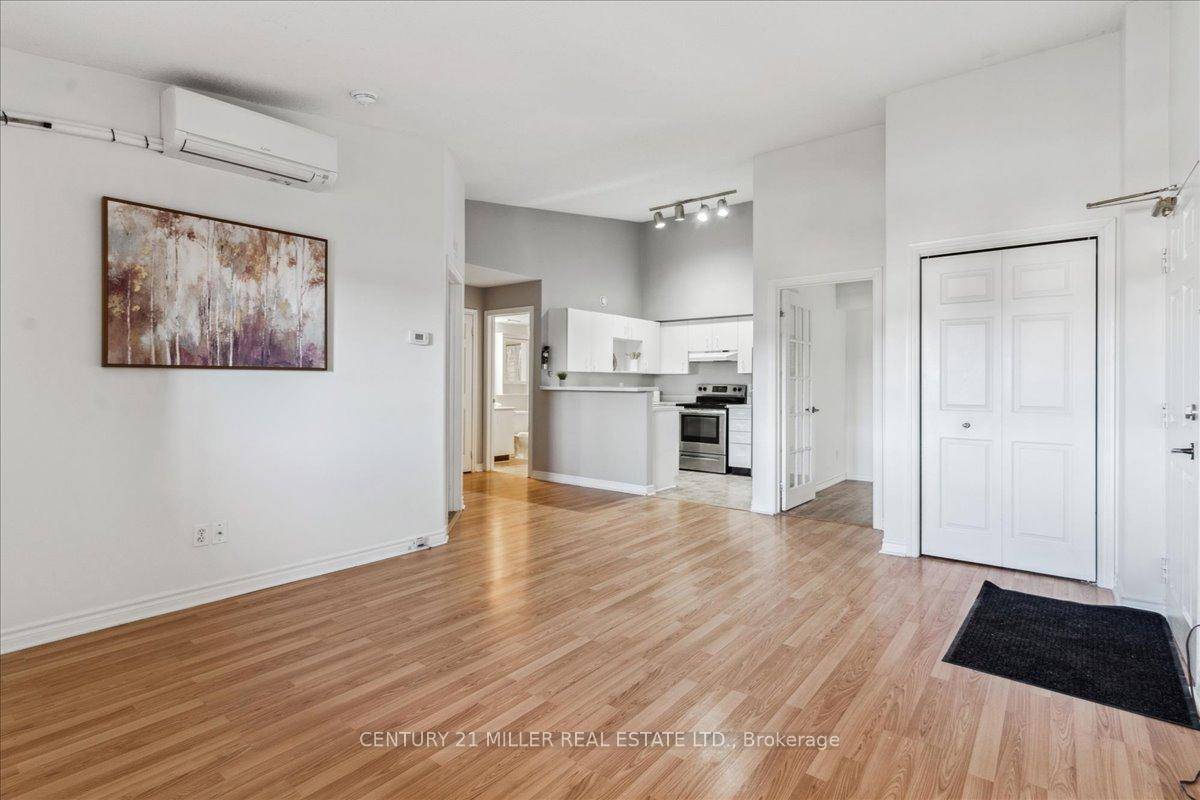 Charming 1 Bedroom Plus Den Condo Bright, Spacious, and Move In Ready !