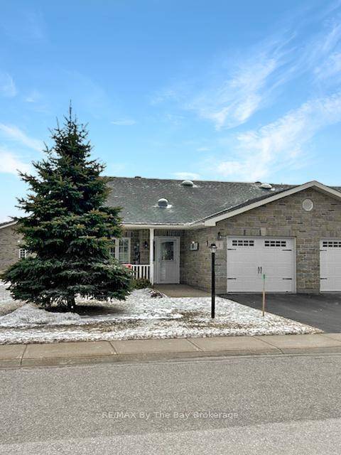 BEAUTIFUL, WELL MAINTAINED END UNIT IN SOUGHT AFTER COUNTRY MEADOWS AN AGE QUALIFIED COMMUNITY.