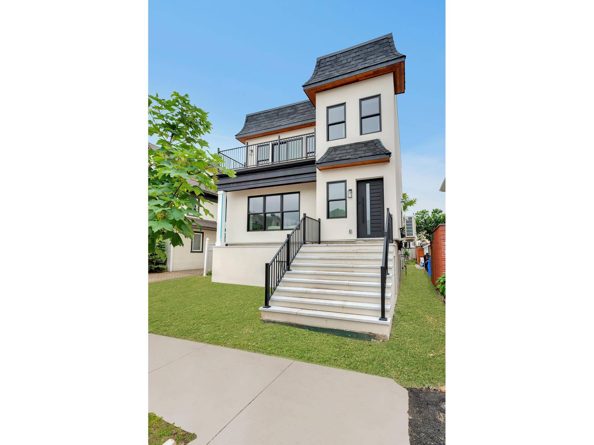 Luxury New Construction Two Unit Home Moments from the Beach in a Gated Community !