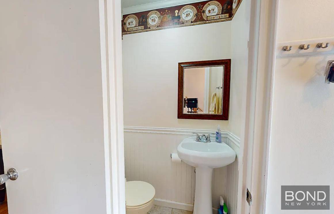 Completely renovated and newly reclassified as a legal two residence, this classic Throgs Neck brick home offers flexibility, style, and potential !
