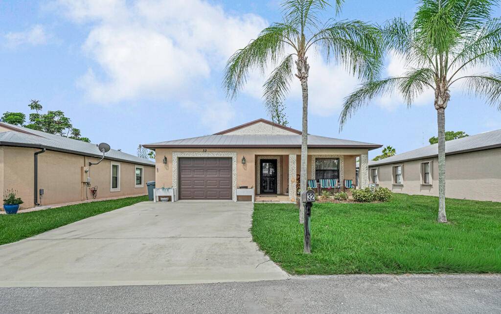 This charming home is located in the highly sought after Spanish Lakes One, one of Port St.
