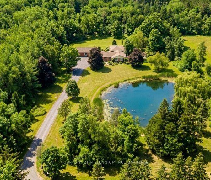 Private Waterfront Oasis on 5 Acres, 15 Minutes from 401, Experience ultimate privacy at this stunning 5 acre country estate with a 3 Car Garage, accessed via a long paved ...