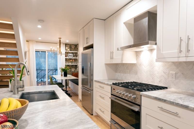 This custom built residence offers a generous 1, 600 square feet of living space and features 4 beds and 3 baths.