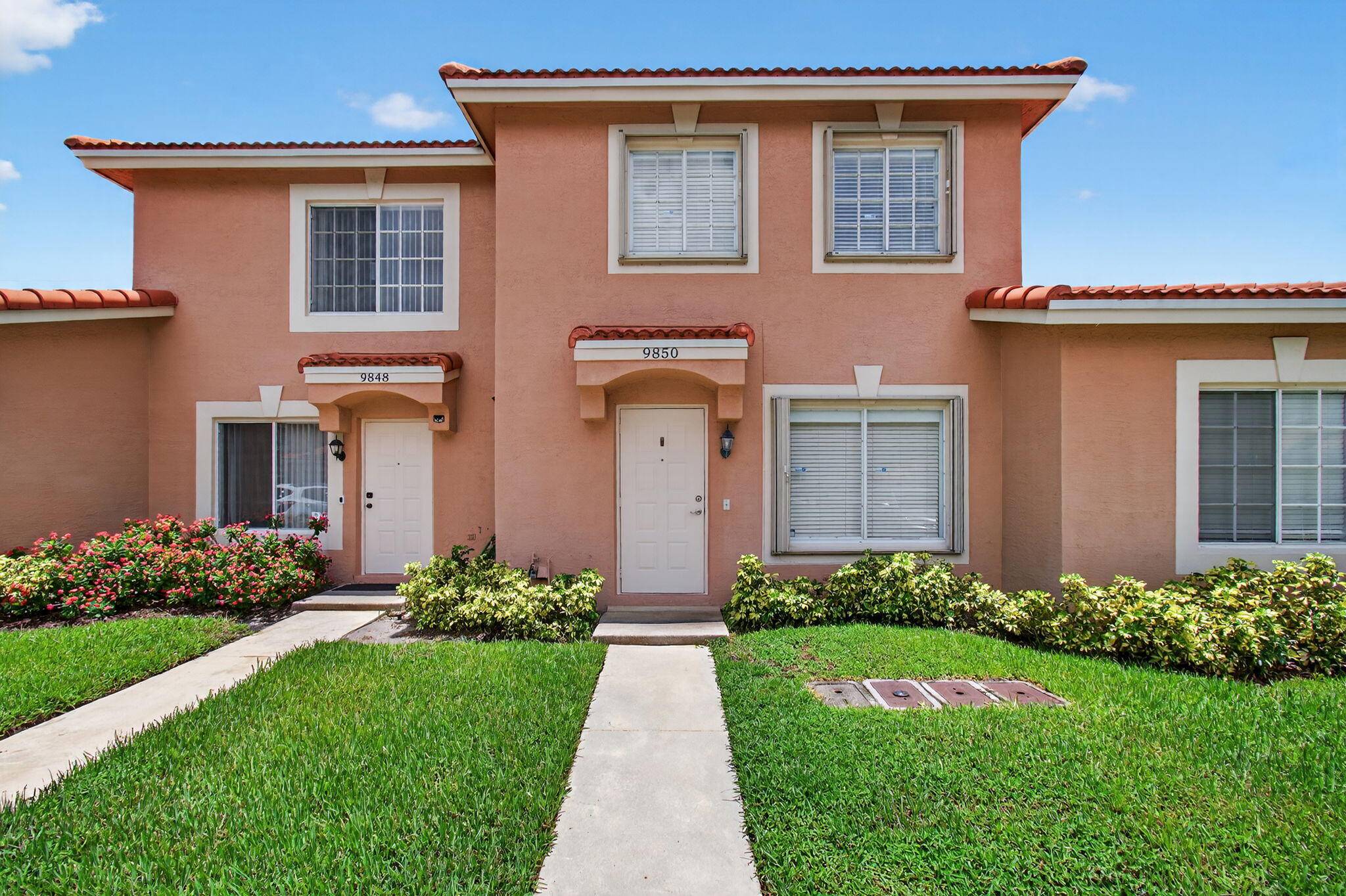 Spectacular townhome in a beautifully maintained gated community.