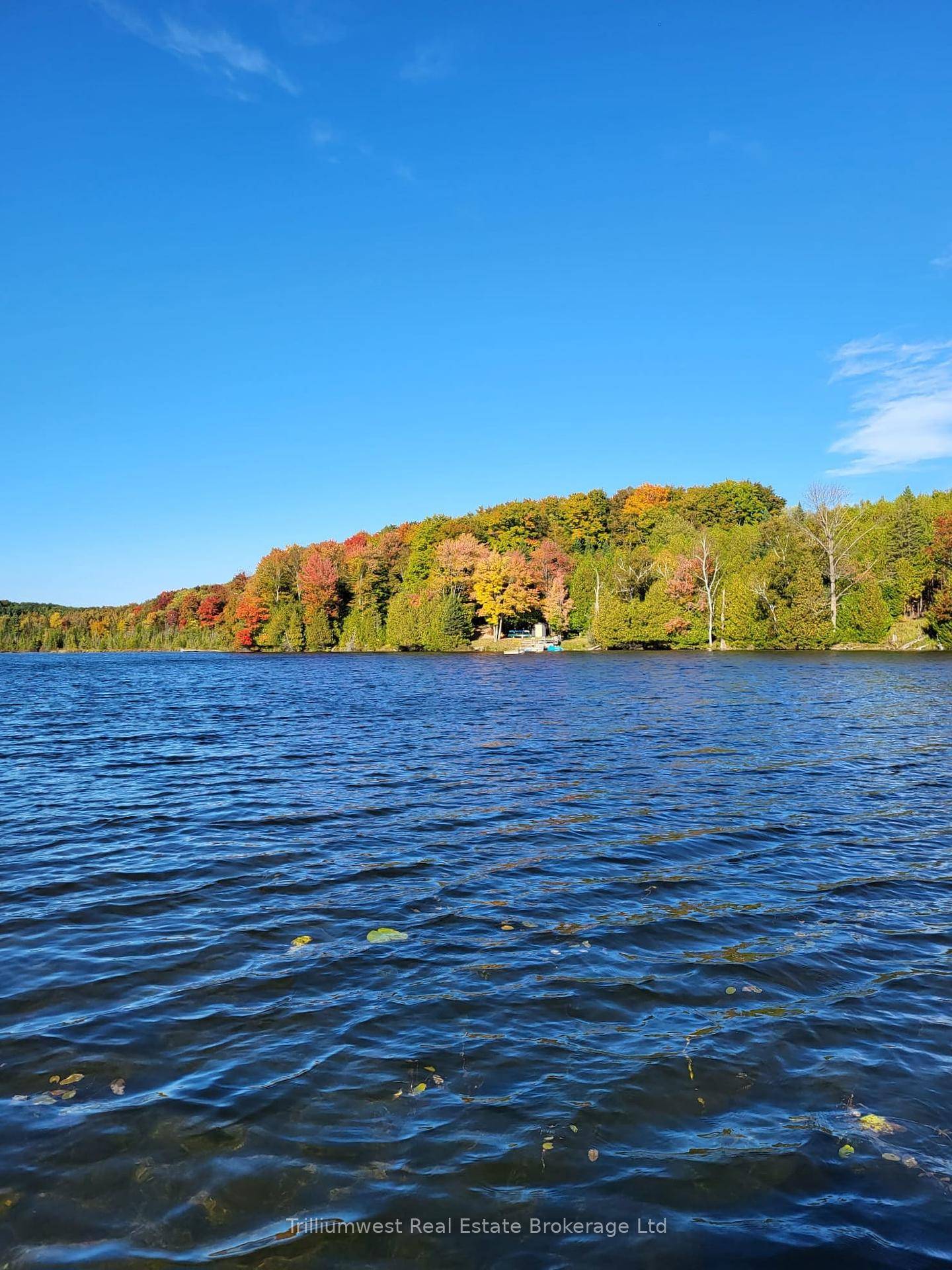 Grab a hot drink and relax on the covered front porch, soaking in the picturesque lakefront views and beautiful changing fall colours.