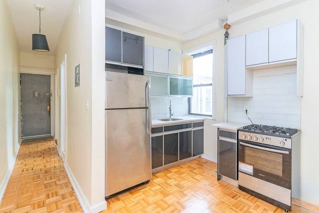 Spacious three bedroom apartment nestled right between Bedford Ave and Washington Ave.