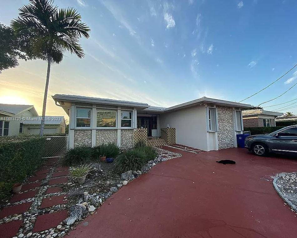 Newer Tile Roof, New Hurricane Impact Windows and Hurricane Shutters all around for big insurance discount.